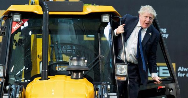 Boris Johnson climbs atop JCB bulldozer in Gujarat