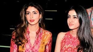 Navya Nanda looks drop-dead gorgeous in a high slit red gown as she poses with mum Shweta Bachchan