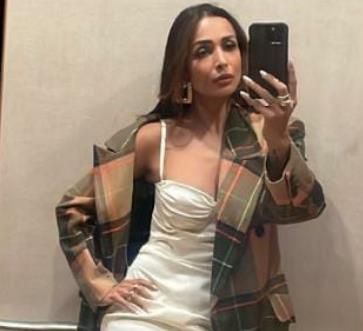 Malaika Arora posted a few photos of her glamorous look in a stunning white dress on her instagram handle.