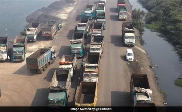 Vehicles will run on a steel slag road in Surat.