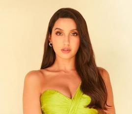 Nora Fatehi's bold look seen in green gown.