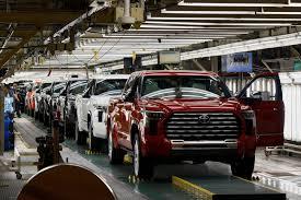 Toyota's global sales, output climb to record. 