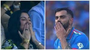 Virat Kohli's historic 50th century in ICC Cricket World Cup celebrated with a flying kiss from Anushka Sharma.