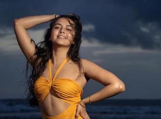 Tejasswi Prakash adds a touch of hotness to the beach.