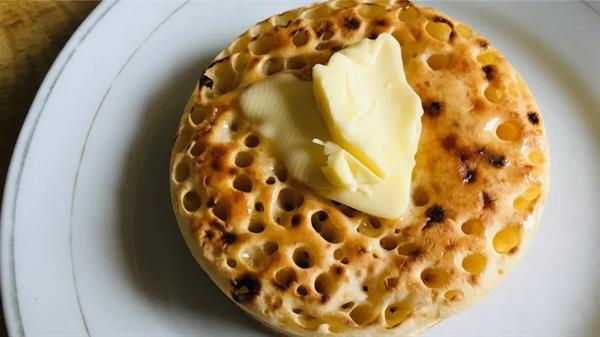 UK inflation falls as crumpet and meat prices drop
