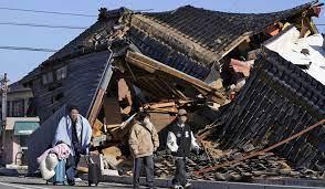 Japan earthquake toll rises to 57, rescuers battle aftershocks, poor weather