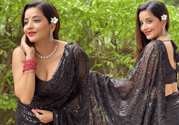 Bhojpuri actress Monalisa stuns in black saree, adding glamour touch. Fans impressed.