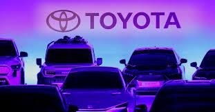 Toyota has cut its electric vehicle production target by a third through 2026 amid a slump in global demand.